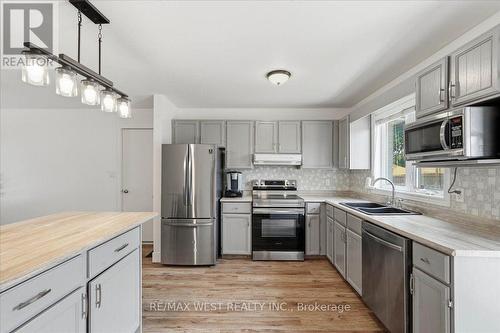 12 Dunnett Drive, Brighton, ON - Indoor Photo Showing Kitchen With Double Sink