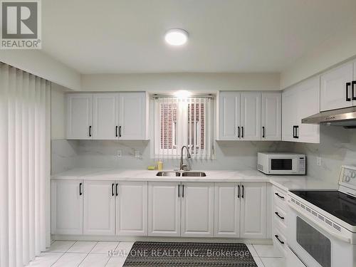13 Mallaby Road, Toronto, ON - Indoor Photo Showing Kitchen With Double Sink