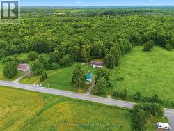 Cleared acreage to the right of house. - 