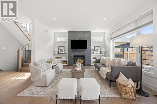 10 Beaty Lane, Zorra (Thamesford), ON - Indoor Photo Showing Living Room With Fireplace