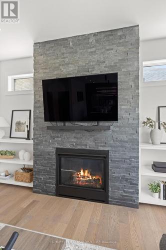 10 Beaty Lane, Zorra (Thamesford), ON - Indoor Photo Showing Living Room With Fireplace