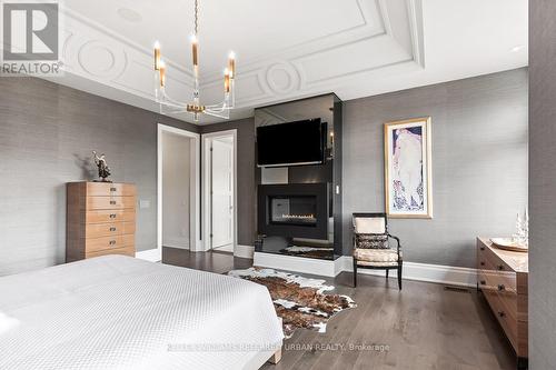 61 Ria Court, King, ON - Indoor Photo Showing Bedroom With Fireplace