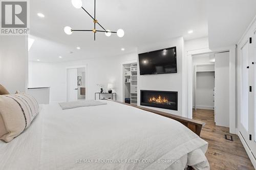 25 Southwind Terrace, Oakville, ON - Indoor Photo Showing Bedroom With Fireplace