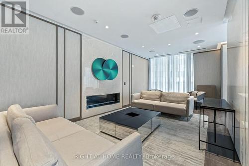 3110 - 115 Blue Jays Way, Toronto, ON - Indoor Photo Showing Living Room With Fireplace