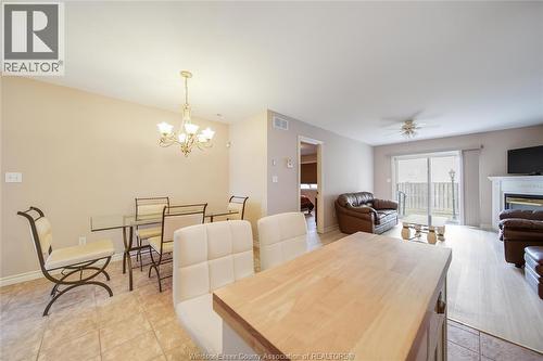 1556 Heatherglen Drive, Tecumseh, ON - Indoor Photo Showing Dining Room With Fireplace