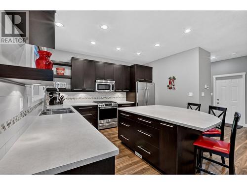 7557 Loedel Crescent, Prince George, BC - Indoor Photo Showing Kitchen With Double Sink With Upgraded Kitchen