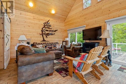 12 - 3998 Highway 141, Muskoka Lakes (Watt), ON - Indoor Photo Showing Other Room With Fireplace