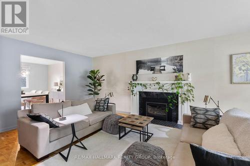 932 Dresden Crescent, Ottawa, ON - Indoor Photo Showing Living Room With Fireplace