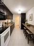 202 - 1445 Wilson Avenue, Toronto, ON  - Indoor Photo Showing Kitchen With Double Sink 