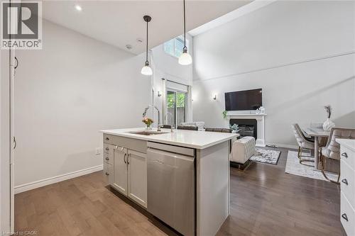 254 Gosling Gardens Unit# 12, Guelph, ON - Indoor Photo Showing Kitchen With Fireplace