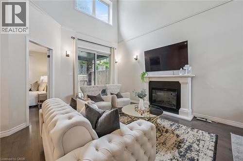 254 Gosling Gardens Unit# 12, Guelph, ON - Indoor Photo Showing Living Room With Fireplace