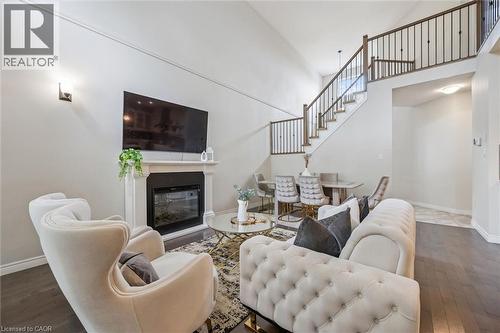 254 Gosling Gardens Unit# 12, Guelph, ON - Indoor Photo Showing Living Room With Fireplace