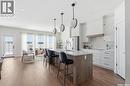 22 720 Brighton Boulevard, Saskatoon, SK  - Indoor Photo Showing Kitchen With Upgraded Kitchen 