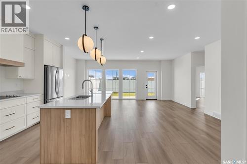 10 720 Brighton Boulevard, Saskatoon, SK - Indoor Photo Showing Kitchen With Double Sink With Upgraded Kitchen