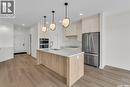 10 720 Brighton Boulevard, Saskatoon, SK  - Indoor Photo Showing Kitchen With Double Sink 