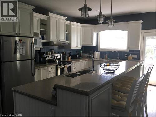 38 Walter Street, Turkey Point, ON - Indoor Photo Showing Kitchen With Double Sink