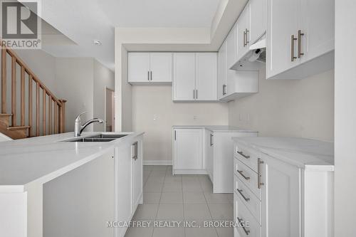 42 Golf Links Drive, Loyalist (Bath), ON - Indoor Photo Showing Kitchen With Double Sink