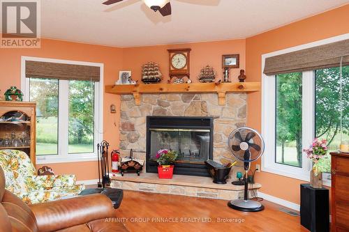 243 Fairbairn Road, Kawartha Lakes (Bobcaygeon), ON - Indoor Photo Showing Living Room With Fireplace