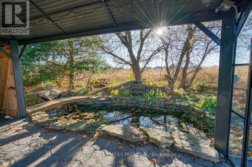 ideal pond near the gazebo - 421 Summers Road, Rideau Lakes, ON - Outdoor With View