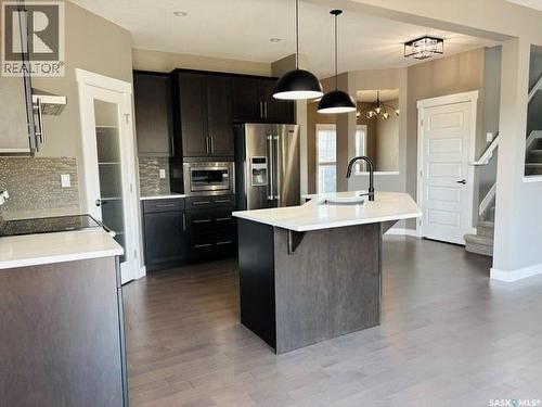 411 Flynn Lane, Saskatoon, SK - Indoor Photo Showing Kitchen With Upgraded Kitchen