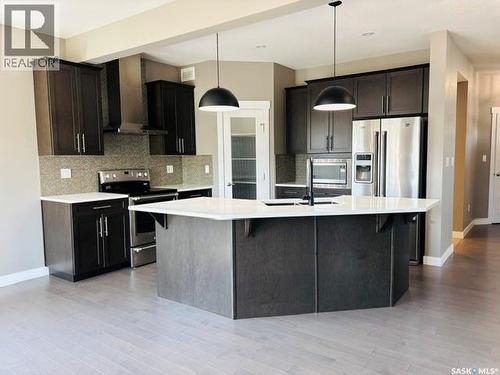 411 Flynn Lane, Saskatoon, SK - Indoor Photo Showing Kitchen With Upgraded Kitchen
