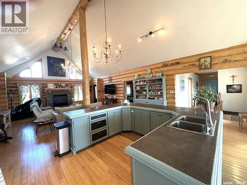 Canada Goose Lodge, Bayne Rm No. 371, SK - Indoor Photo Showing Kitchen With Fireplace With Double Sink