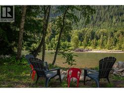 Fire pit overlooking Slocan River. - 