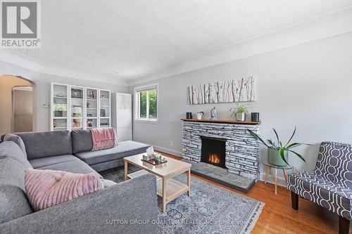 151 East 16Th Street, Hamilton, ON - Indoor Photo Showing Living Room With Fireplace