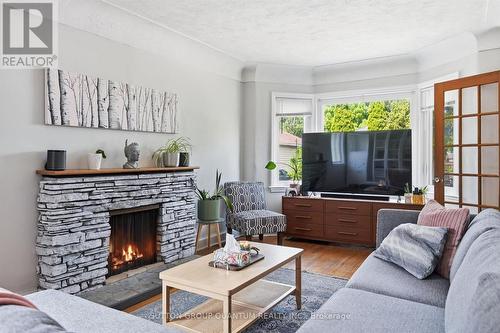 151 East 16Th Street, Hamilton, ON - Indoor Photo Showing Living Room With Fireplace