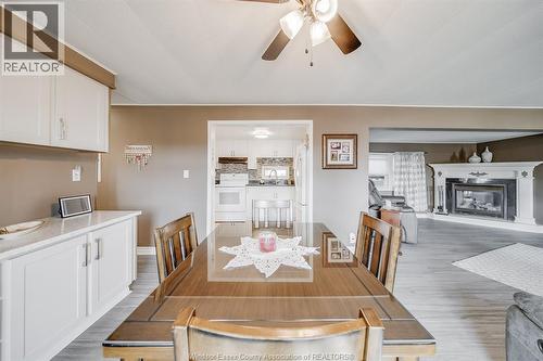 110 Brooks Boulevard, Lakeshore, ON - Indoor Photo Showing Dining Room With Fireplace
