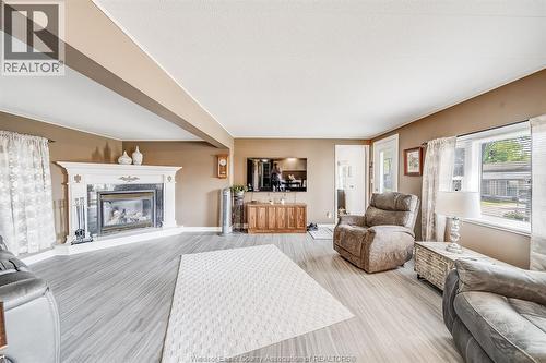 110 Brooks Boulevard, Lakeshore, ON - Indoor Photo Showing Living Room With Fireplace
