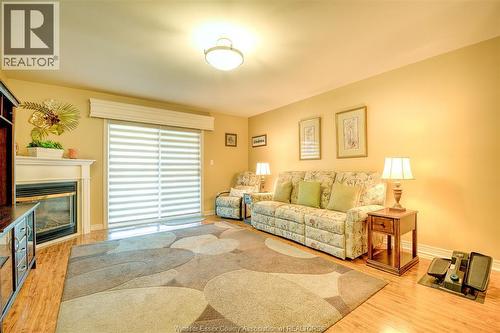 81 Crosswinds, Kingsville, ON - Indoor Photo Showing Living Room With Fireplace