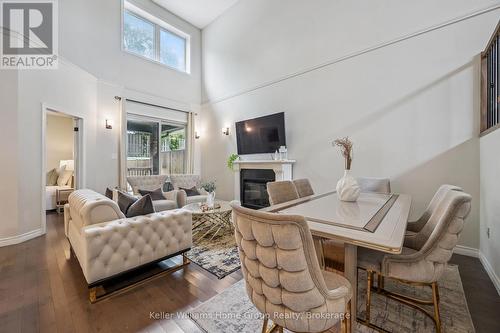 12 - 254 Gosling Gardens, Guelph (Clairfields/Hanlon Business Park), ON - Indoor Photo Showing Living Room With Fireplace