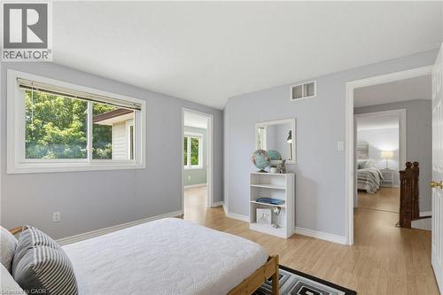 Bedroom with light gray walls, white trim. - 2188 Bader Crescent, Burlington, ON - Indoor Photo Showing Bedroom