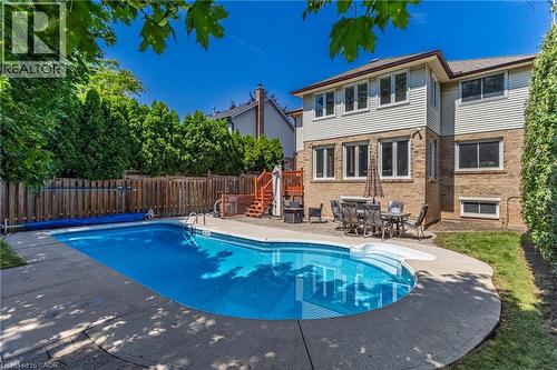 In-ground swimming pool with concrete surround - 2188 Bader Crescent, Burlington, ON - Outdoor With In Ground Pool With Deck Patio Veranda