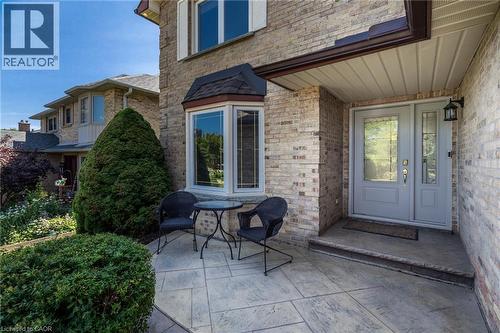 Brick exterior facade with a covered entry - 2188 Bader Crescent, Burlington, ON - Outdoor With Deck Patio Veranda With Exterior