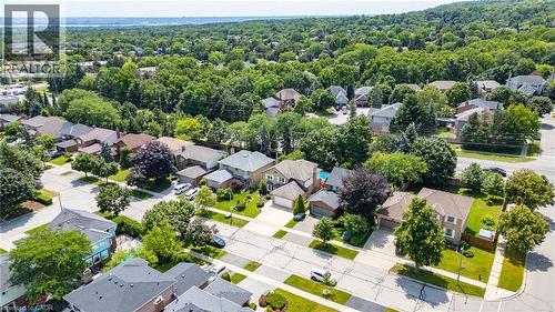 Aerial perspective showcasing residential properties with established landscaping and tree-lined streets - 2188 Bader Crescent, Burlington, ON - Outdoor With View