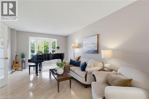 Spacious room with light wood-finish flooring and neutral wall tones - 2188 Bader Crescent, Burlington, ON - Indoor Photo Showing Living Room