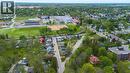 Aerial perspective of a residential area featuring established homes and verdant landscapes - 9 James Street, Simcoe, ON 