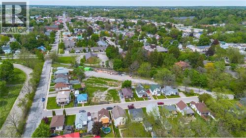 Aerial perspective showcasing a residential neighborhood with varied architectural styles - 9 James Street, Simcoe, ON 