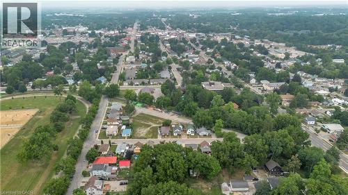 Aerial perspective showcasing a residential area with varied housing styles - 9 James Street, Simcoe, ON 