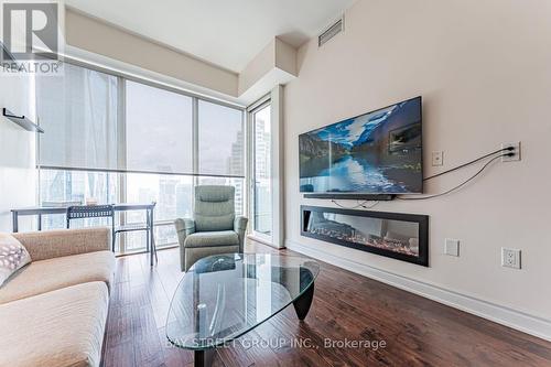 5403 - 8 The Esplanade, Toronto, ON - Indoor Photo Showing Living Room With Fireplace