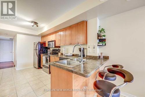 204 - 35 Strangford Lane, Toronto, ON - Indoor Photo Showing Kitchen With Double Sink