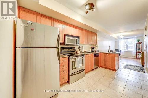 204 - 35 Strangford Lane, Toronto, ON - Indoor Photo Showing Kitchen With Double Sink