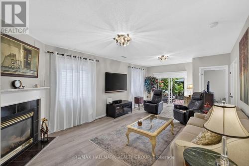 139 Castle Glen Crescent, Ottawa, ON - Indoor Photo Showing Living Room With Fireplace