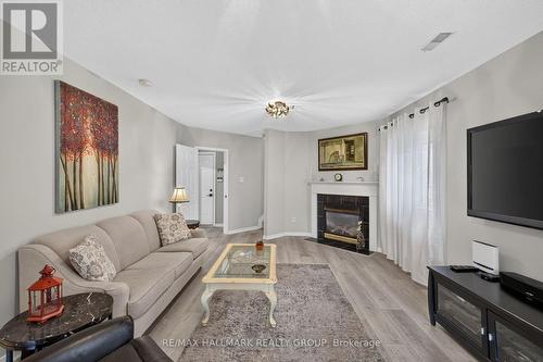 139 Castle Glen Crescent, Ottawa, ON - Indoor Photo Showing Living Room With Fireplace