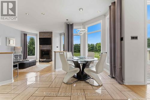 1607 Landel Drive, Ottawa, ON - Indoor Photo Showing Dining Room With Fireplace