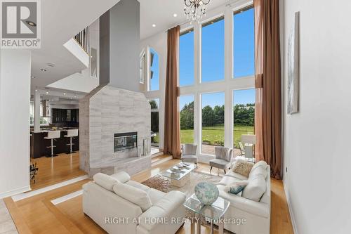 1607 Landel Drive, Ottawa, ON - Indoor Photo Showing Living Room With Fireplace