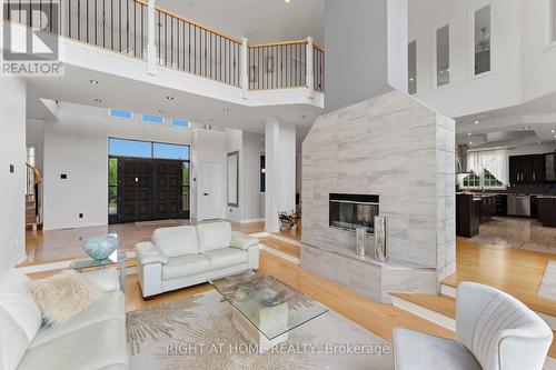 1607 Landel Drive, Ottawa, ON - Indoor Photo Showing Living Room With Fireplace