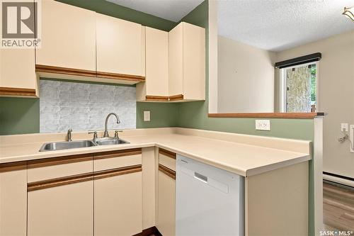 102 431 Tait Court, Saskatoon, SK - Indoor Photo Showing Kitchen With Double Sink